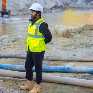 man standing near body of water